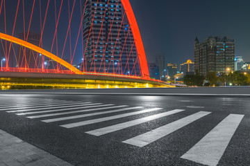 Fototapeta na wymiar empty asphalt road with zebra crossing and skyscrapers in modern city.