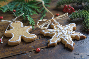 Various cookies for children with Christmas symbols in their environment.