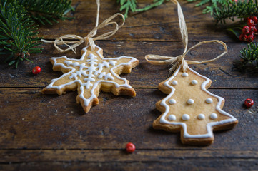 Various cookies for children with Christmas symbols in their environment.