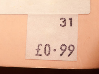 close up of price tag on back of book charity shop 0.99 99p