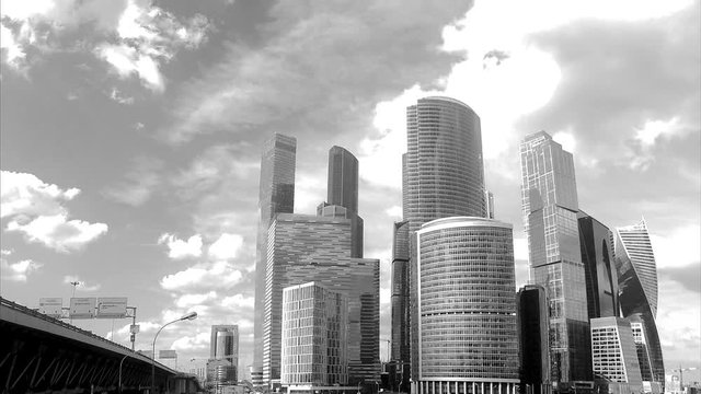 skyscrapers and bridge black and white timelapse