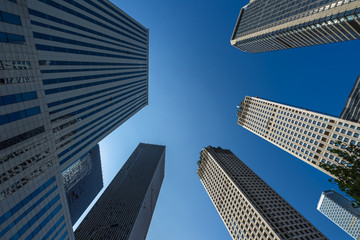 Fototapeta na wymiar low angle view of skyscrapers in city of China..