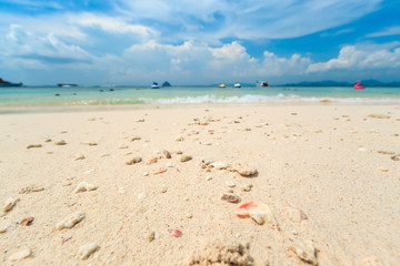 Kai island, Phuket, Thailand. Small tropical island with white sandy beach and blue transparent water of Andaman sea.