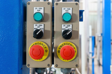 control panel box button and emergency button.