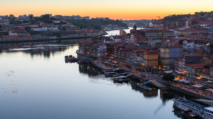 Night view of the Douro river and Ribeiro, Porto, Portugal.