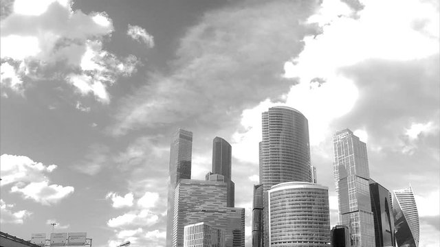 skyscrapers and bridge at summer black and white timelapse