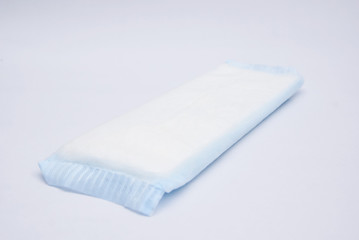 Disposable Pregnancy Or Maternity Pad Over White Background