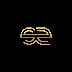Initial lowercase letter sz, linked outline rounded logo, elegant golden color on black background