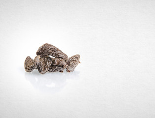 Dried salted peach or Chinese dried plum on a background.