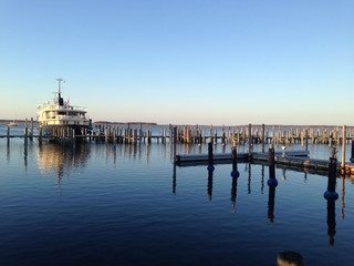 Fototapeta premium A Boat Docked at Sag Harbor, Long Island, New York