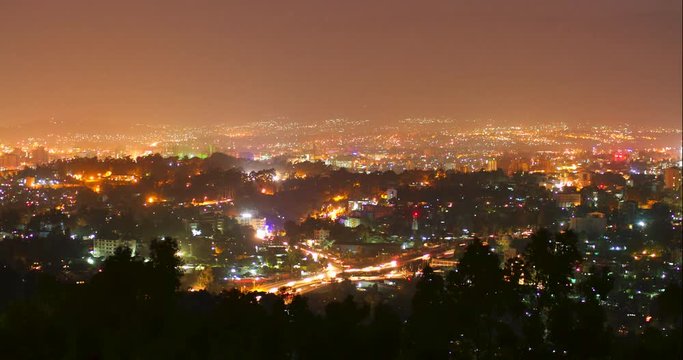 Night timelapse of Addis Ababa skyline at sunset, Ethiopia.