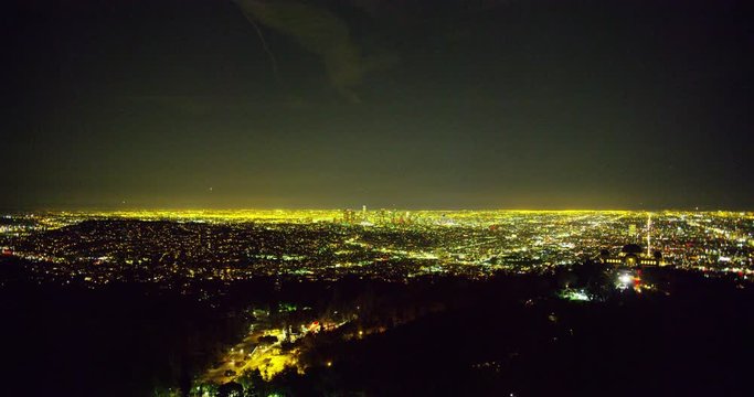 Wide shot of The Griffith Observatory and DTLA skyline in Los Angeles, California.