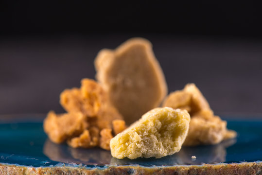 Assorted marijuana extraction concentrate aka wax crumble on dark background