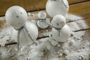 High angle view of artificial snowman decoration - Powered by Adobe