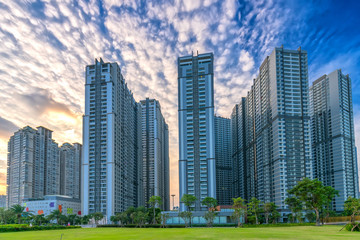 Fototapeta na wymiar Ho Chi Minh City, Vietnam - November 30th, 2017: Panoramic skyscrapers at sunset with sky impressive in apartment, architectural extended life material development people in Ho Chi Minh City, Vietnam