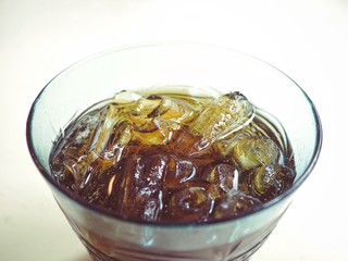 Cola with ice cubes