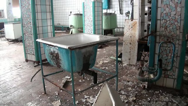 Canteen dining room in Pyramiden Spitsbergen Arctic. Russian neglected township. Canned place times of Soviet Union. Time stood still of North Pole.