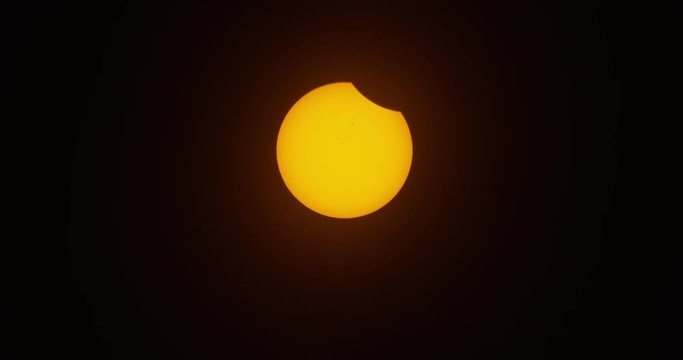 Moon moving across the sun during the solar eclipse as seen in the path of totality over Mackay, Idaho.