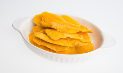 Dried Mango or Dried Mango slices on a background.
