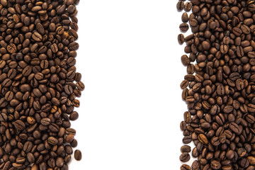roasted coffee beans, can be used as a background, Beans isolated on  white background, Free from copy space.