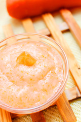 Baby food ( carrot ) close up onwooden background  table