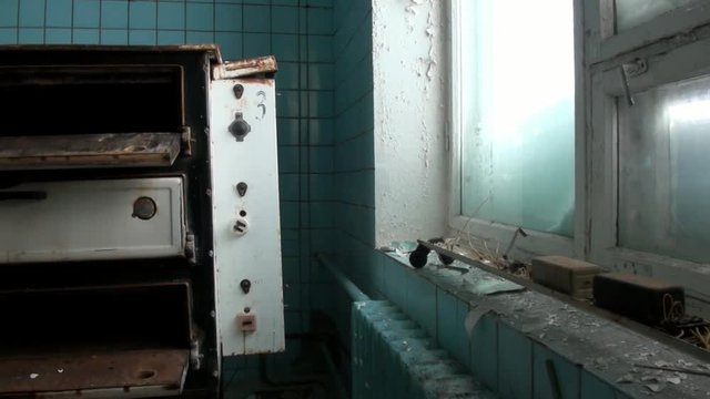 Canteen dining room in Pyramiden Spitsbergen Arctic. Russian neglected township. Canned place times of Soviet Union. Time stood still of North Pole.