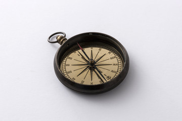 Fototapeta na wymiar vintage compass on the white background.