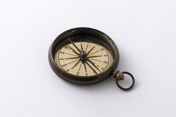 vintage compass on the white background.