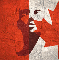 Human head silhouette. Face front view. Elegant silhouette of part of human face textured by Flag of Canada. Grunge concrete texture