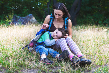 Fototapeta premium child is resting by the mother in her arms