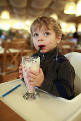 Child has milkshake