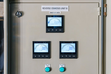 Technical display on control panel with electrical equipment devices cabinet of reverse osmosis system - obrazy, fototapety, plakaty