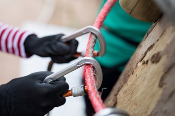 Fototapeta na wymiar Carabiner attached to the ropes