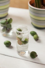 detox water with fruit in glass, vertical