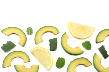 healthy food. sliced avocado isolated on white background. top view