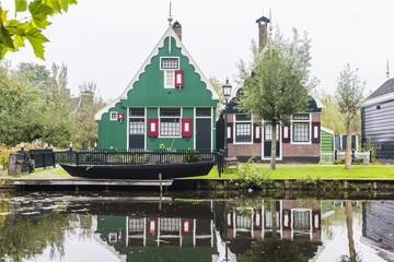 Traditional Dutch houses in Zaanse Schans. The Zaanse Schans is a typically Dutch small village in Amsterdam, Netherlands..