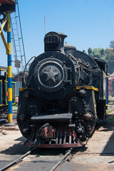 Fototapeta na wymiar Nilgiri mountain railway. Blue train. Unesco heritage. Narrow gauge