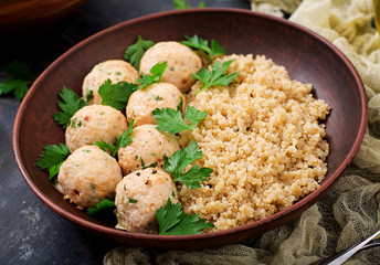 Baked meatballs of chicken fillet with garnished with quinoa. Flat lay. Top view. Proper nutrition. Sports nutrition. Dietary menu
