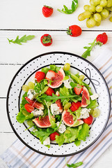 Easy vegetarian salad with figs, strawberries, grapes, blue cheese 