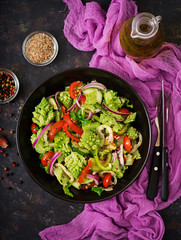Vegan salad of fresh vegetables and cabbage romanesko. Dietary menu. Proper nutrition. Flat lay. Top view