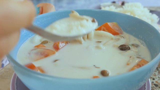 4K close up Coconut milk soup with vegetables