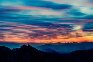 Foto op Canvas lenticular clouds at sunset over italian Alps - Lombardy Italy     © UMB-O