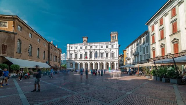 Main square piazza Vecchia in an Italian town Bergamo timelapse. Library and historic buildings.