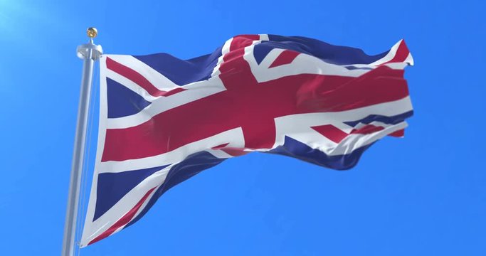 Flag of the United Kingdom waving at wind with blue sky, loop