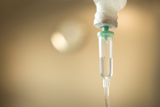 Saline solution drip for patient in patient room