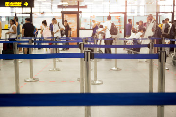 Passengers check-in line at the airport