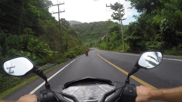 FPV of a person riding a scooter in Phuket