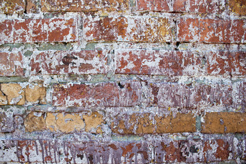 Old destroyed wall from a red brick