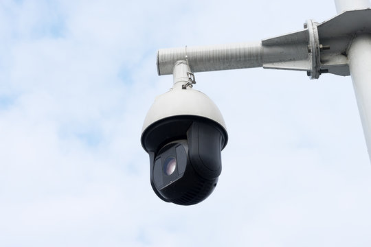 cctv camera in cloud sky