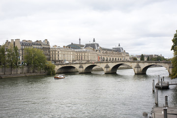 View landscape and cityscape of Paris city with river cruises sailing in Seine river